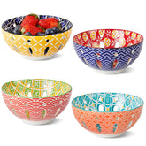 Metahom ceramic berry basket in vibrant colors, ideal for colorful fruit display on the counter.