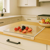 MEWSDEN acrylic cutting board with counter lip keeps countertop tidy.