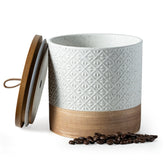 Miamolo ceramic coffee container with lid preserves freshness for beans and grounds.