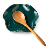 Miamolo ceramic spoon rest with floral design keeps counters clean and clutter-free.