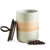 Miamolo coffee storage jar with lid keeps coffee fresh and organized on the counter.