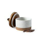 Miamolo small ceramic jar with lid on counter, keeps 5 fl oz of spices fresh.