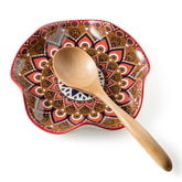 Miamolo spoon rest on stove top with Bohemian pattern, prevents drips and keeps utensils organized.