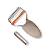 Milk Street Precision Peeler: stainless steel body for durable veggie prep.