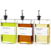MIWUYI olive oil dispenser 3-pack on counter for mess-free pouring.