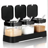 Mlici clear glass condiment jar set with lids and spoons for easy spice access.