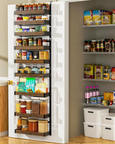Moforoco 9 tier over the door pantry organizer mounted on a kitchen door for space saving storage