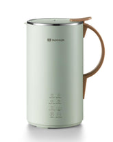 MOKKOM nut milk maker front view on kitchen counter showing compact dairy-free milk solution.