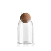 MOLFUJ 750ml ball cork glass canister with airtight lid preserves freshness.