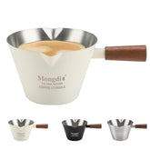 Mongdio espresso measuring cup in stainless steel with wooden handle, durable and easy to clean.