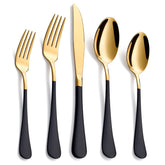 Moxinox 20-piece black and gold silverware on a dining table for elegant everyday dining