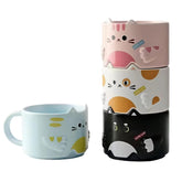 Mualuwi stackable mug set featuring four cat designs for space-saving storage.