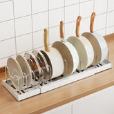 Mustorn pots and pans organizer under-cabinet expanded for versatile storage.