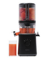 Nama J2 in use with self-feeding hopper for hands-free prep