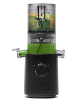 Nama J3 compact juicer on counter with ready-to-use design for quick fresh juice.