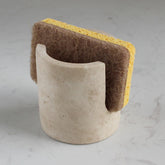 Nawgnail sponge holder on beige marble front view for a dry, organized sink.
