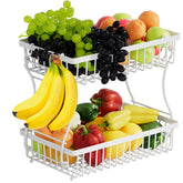 Nbwxcwbs 2-tier fruit basket with banana hanger on a white stand.