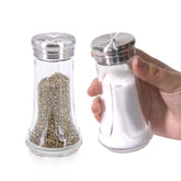 Neodaco salt and pepper shakers in clear glass showing remaining spices.