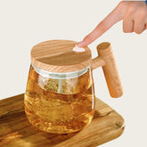 NeovaHome self-stirring mug with champagne gold glass, quick blending for coffee or tea.