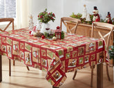 Newbridge Holiday Forest Friends tablecloth with woodland animals adds festive dining charm.