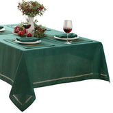 Newbridge Provence lattice tablecloth 60x120 evergreen on a festive table protects surfaces with holiday charm.