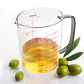 Newness 2-Cup Glass Measuring Cup with clear readouts for quick, accurate measurements.