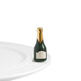 Nora Fleming champagne bottle mini front view for festive table decor