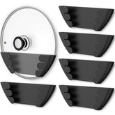 Niceyos pot lid organizer on a door mount keeps lids easily accessible.