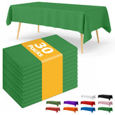 Niuara green tablecloth laid on a 6ft rectangle table for quick cleanup after meals.