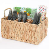 Niuirt wicker party silverware caddy top view keeps utensils neatly organized on the counter.