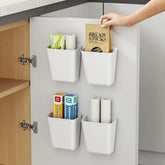 Nmgkokew 4-piece cabinet door storage boxes attached to a kitchen cabinet for extra organization
