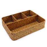 Nonam wicker 4-section tea bag holder on a kitchen counter for organized tea accessories.