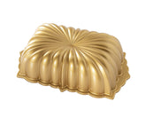 Nordic Ware Classic Fluted Loaf Pan Gold top view highlights intricate cake detail