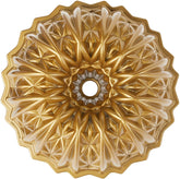 Nordic Ware Cut Crystal Bundt pan in gold with intricate swirl close-up