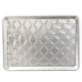 Nordic Ware embossed starburst pan; top view highlights browning potential.