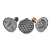 Nordic Ware Honeybee stamps set creates intricate bee-inspired cookie designs for shortbread.