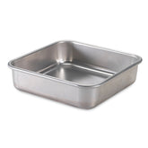 Nordic Ware natural aluminum square pan top view highlighting warp-resistant reinforced rim for even baking