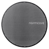 Normcore puck screen on a tamped puck for balanced espresso extraction