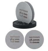 Normcore puck screen with stand promotes even water distribution for balanced espresso.