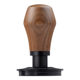 Normcore tamper titanium PVD base closeup showing durability and smooth tamping surface