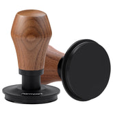 Normcore Tamper V4.1 with flat base on a portafilter for consistent extraction