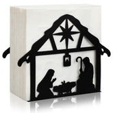 Nuogo Christmas nativity napkin holder on black metal, adds festive table decor.