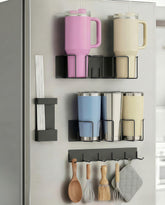 Oasis Origin magnetic cup holder on fridge keeps 40oz tumblers upright and secure.