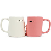 Occasionals kissing couple mug set ideal for shared morning coffee.