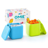 OmieBox dips container blue-lime two-pack neatly sits inside a lunchbox.