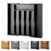 Oridom expandable bamboo drawer organizer in black, fits wide drawers for organized flatware.