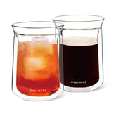 Ovalware double-wall glass cup set keeps beverages hot or cold without heat transfer.