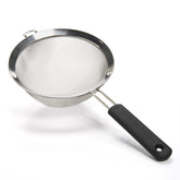 OXO Good Grips 8 inch strainer with fine mesh for precise draining of fruit and pasta.