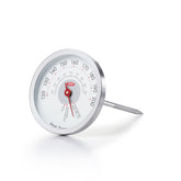 OXO Good Grips Chef's Precision analog thermometer in meat for steady, accurate cooking readings.