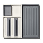 OXO Good Grips large expandable drawer keeps long tools neatly in reach.
